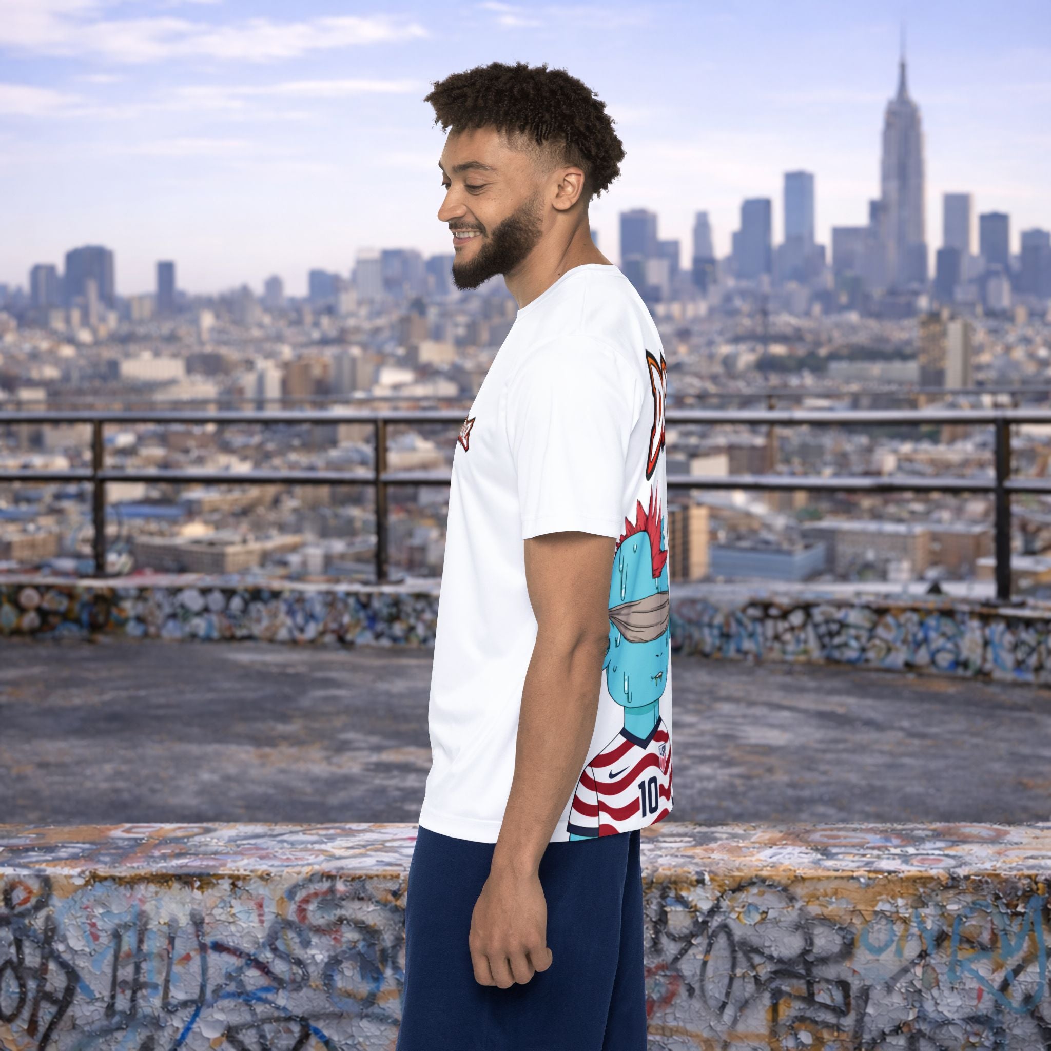 Male model wearing USA Christian Pulisic #10 soccer jersey on urban rooftop backdrop