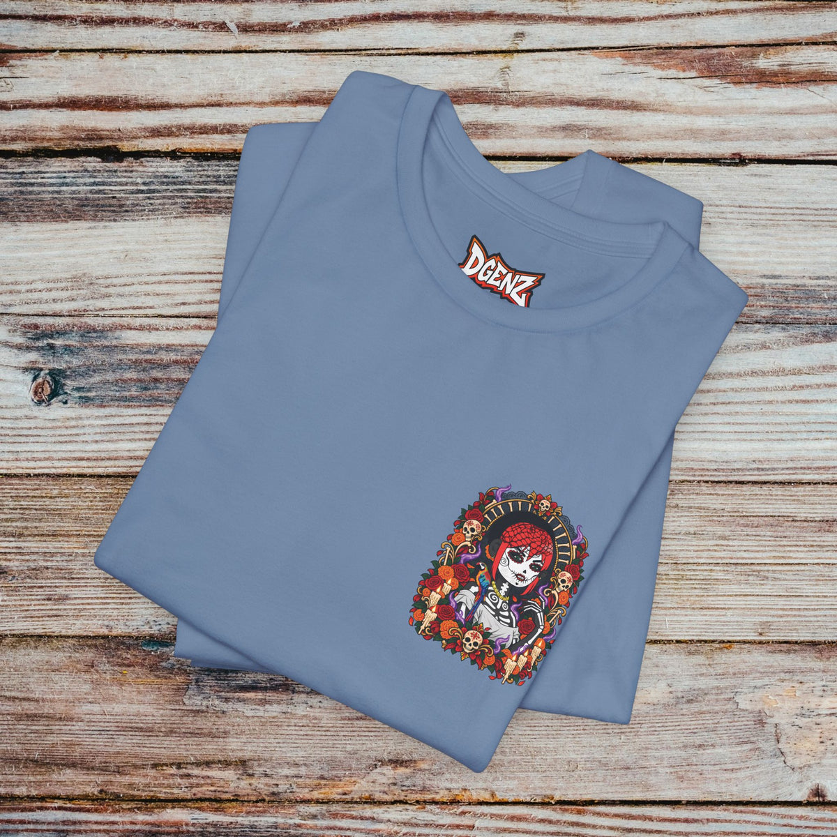 Folded Steel Blue DGENZ Día de los Muertos NFT T-Shirt with colorful chest design