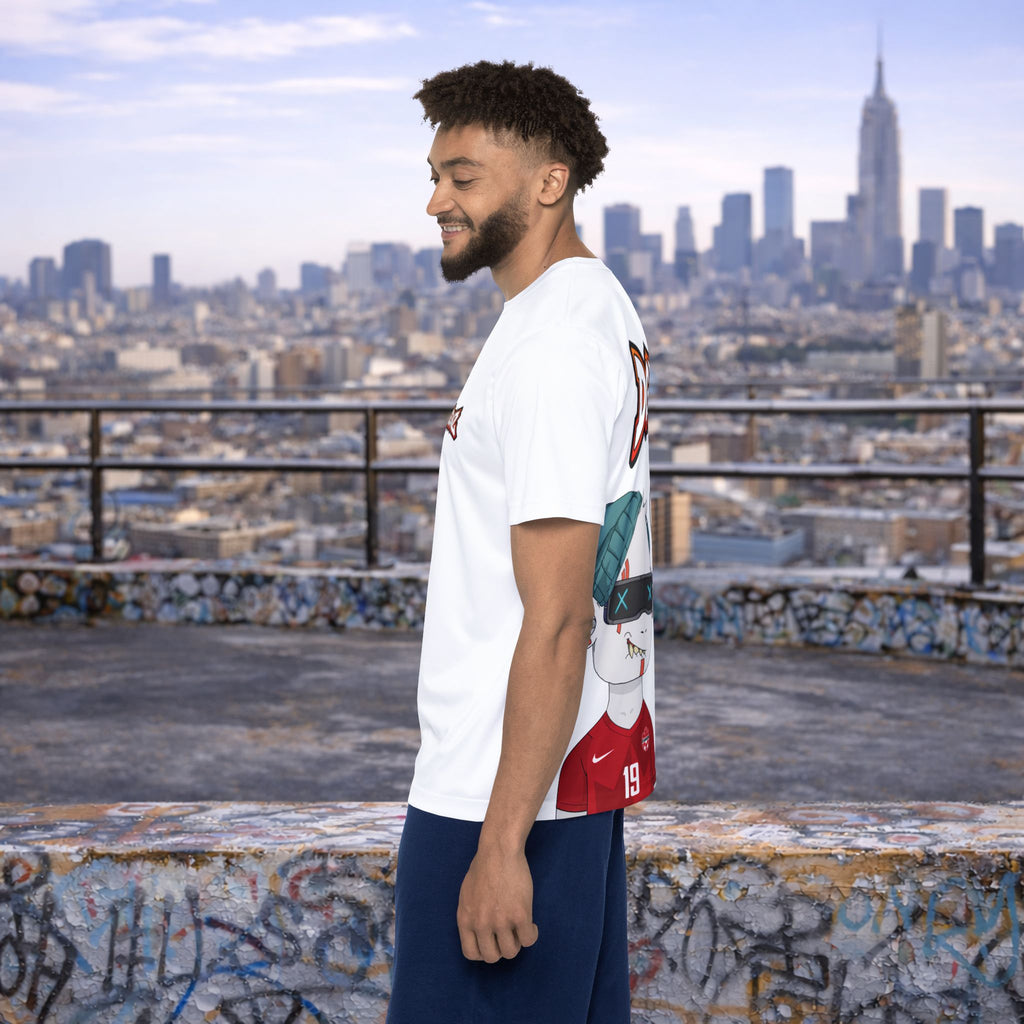 Side view of male model wearing FIFA x DGENZ Canada soccer jersey on urban rooftop