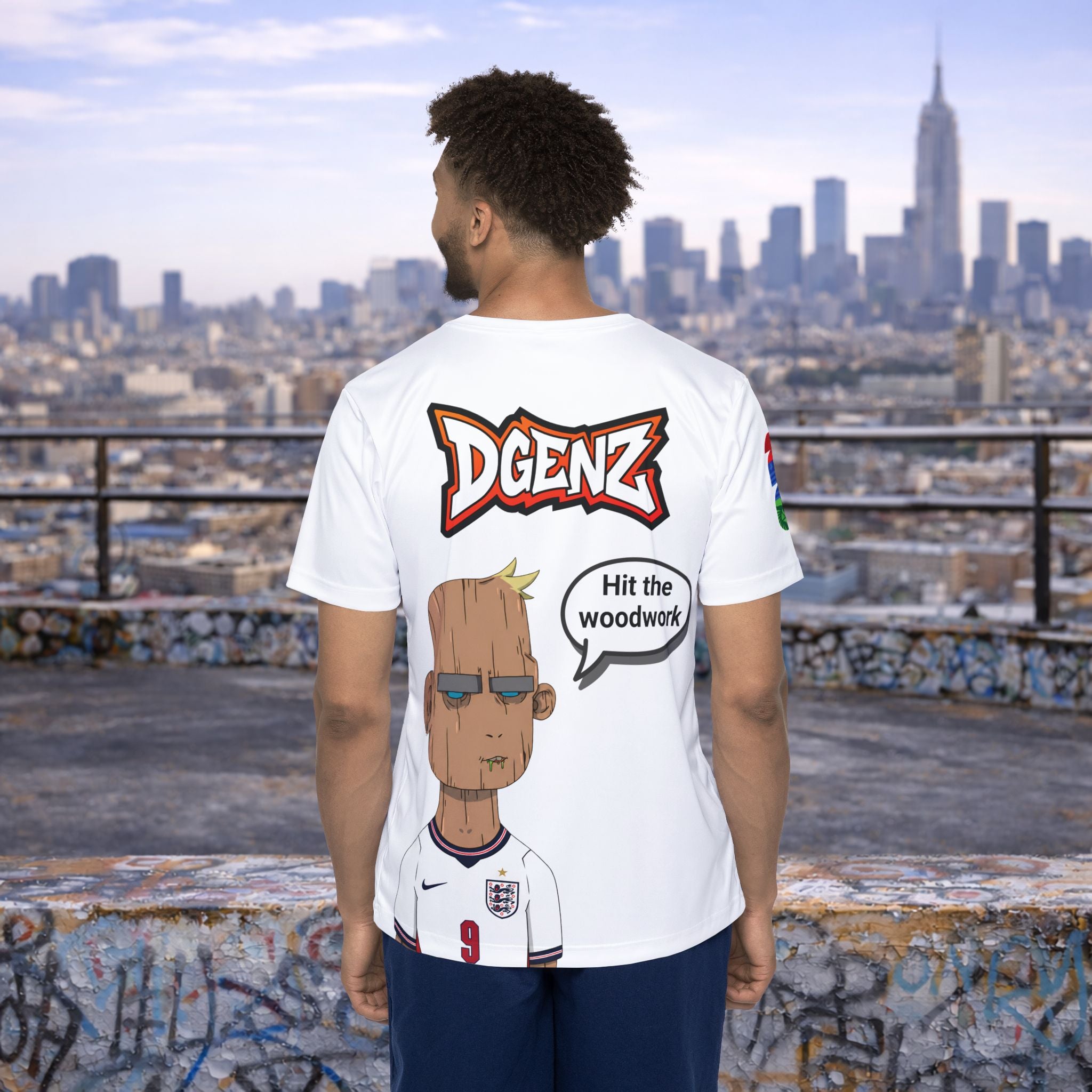 Back view of male model wearing white FIFA x DGENZ England jersey with Harry Kane-inspired character graphic and speech bubble