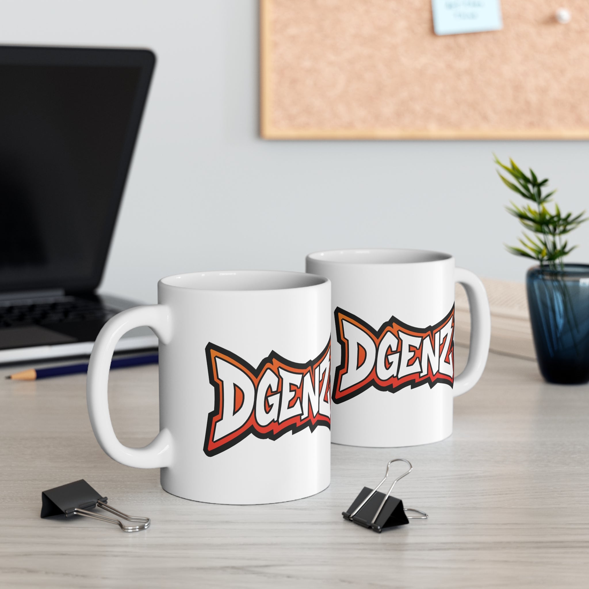 Dgenz coffee mug with bold logo on a crypto trading desk