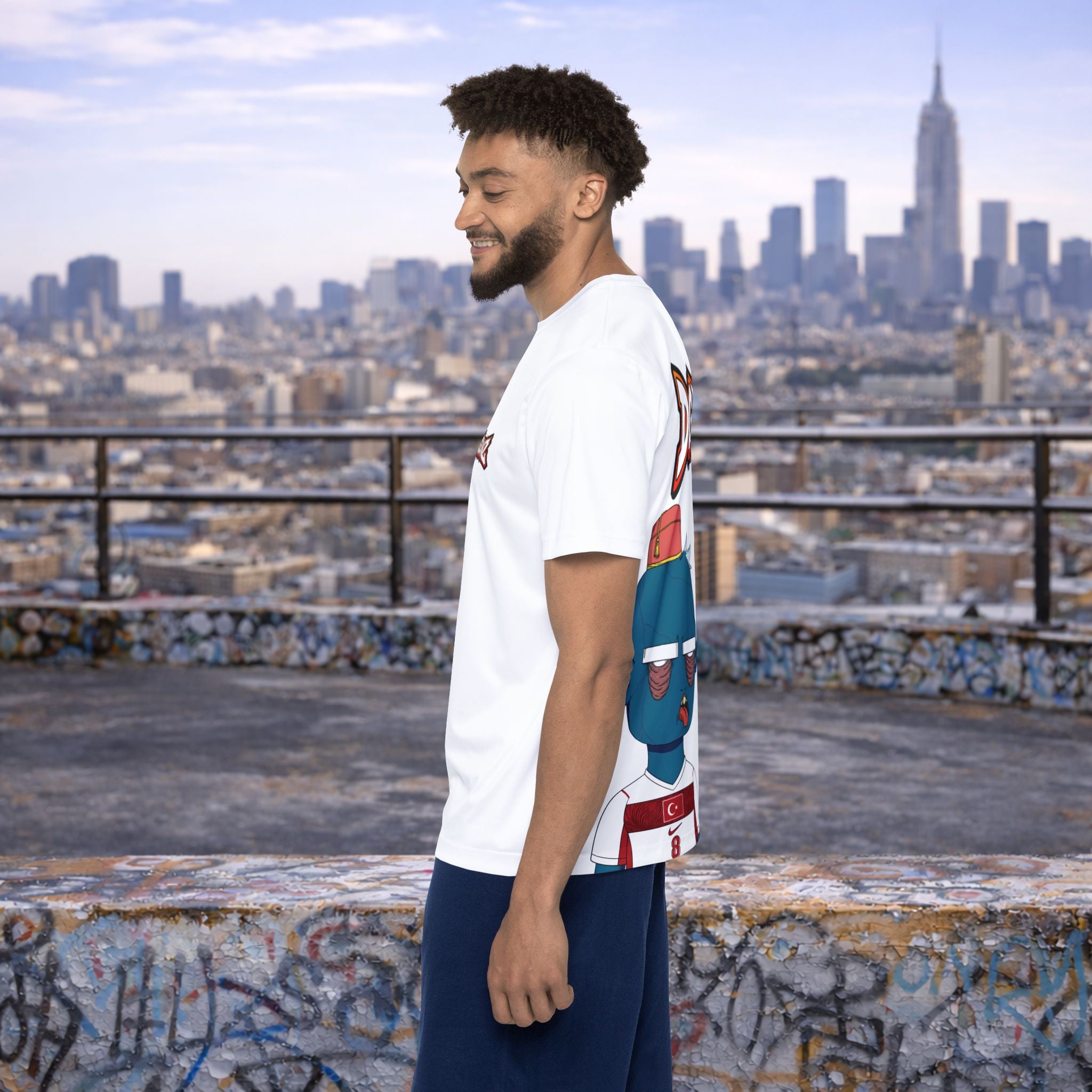 Male model wearing Turkey Arda Güler #8 soccer jersey on urban rooftop backdrop